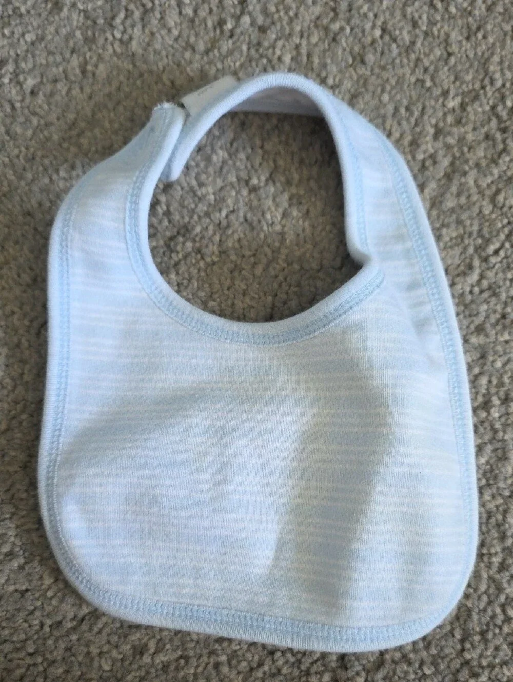 White Baby Bib with Light Blue Trim and Train Motif